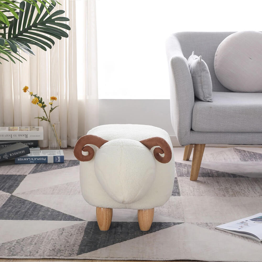 Side angle of the decorative kids sheep footstool in a modern childrens room setting.