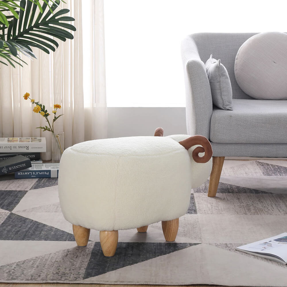 Side angle of the decorative kids sheep footstool in a modern childrens room setting.