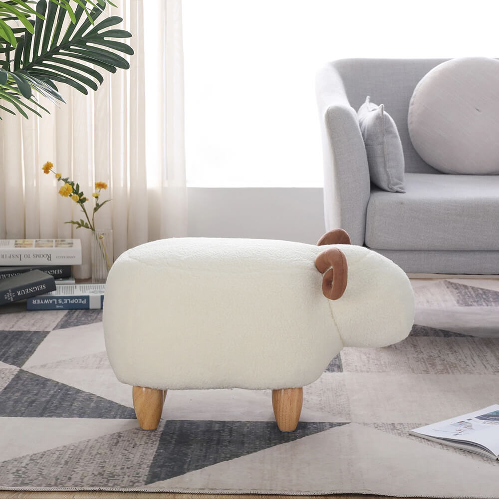 Close-up of the footstools unique sheep shape, highlighting its fun design and plush texture.