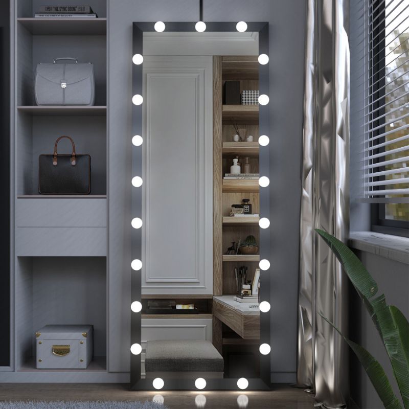 Illuminated full body mirror showcasing adjustable lighting in a stylish bedroom.