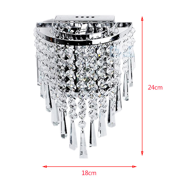 Close-up of the crystal wall lamps polished edges and high-quality materials.