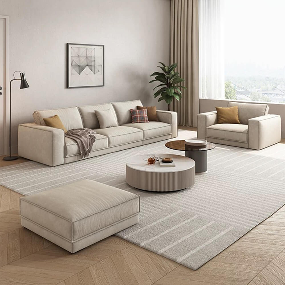 Elegant wide armrest luxury sofa showcasing its plush pillows and modern design.
