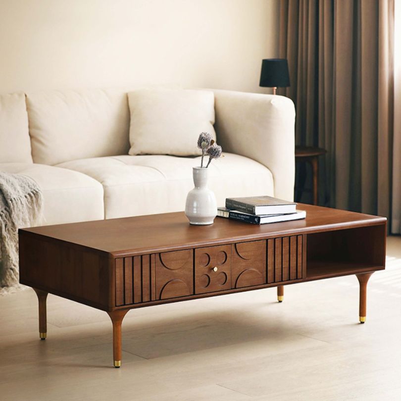 Elegant mid-century coffee table showcasing 3D visual carving patterns and side drawers.