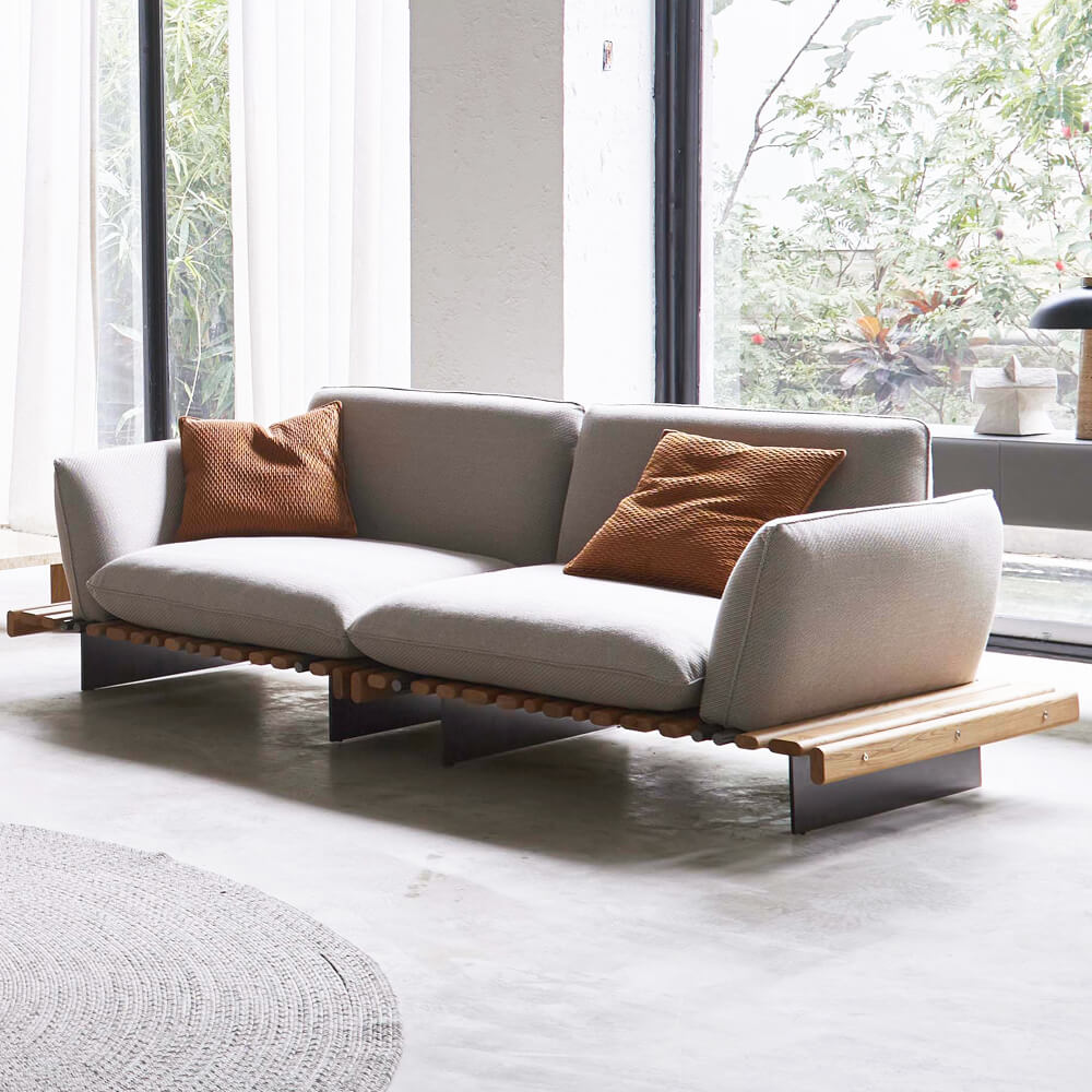 Front-angle view of the SlatCraft Deep Modular Sofa styled in a mid-century living room setup.