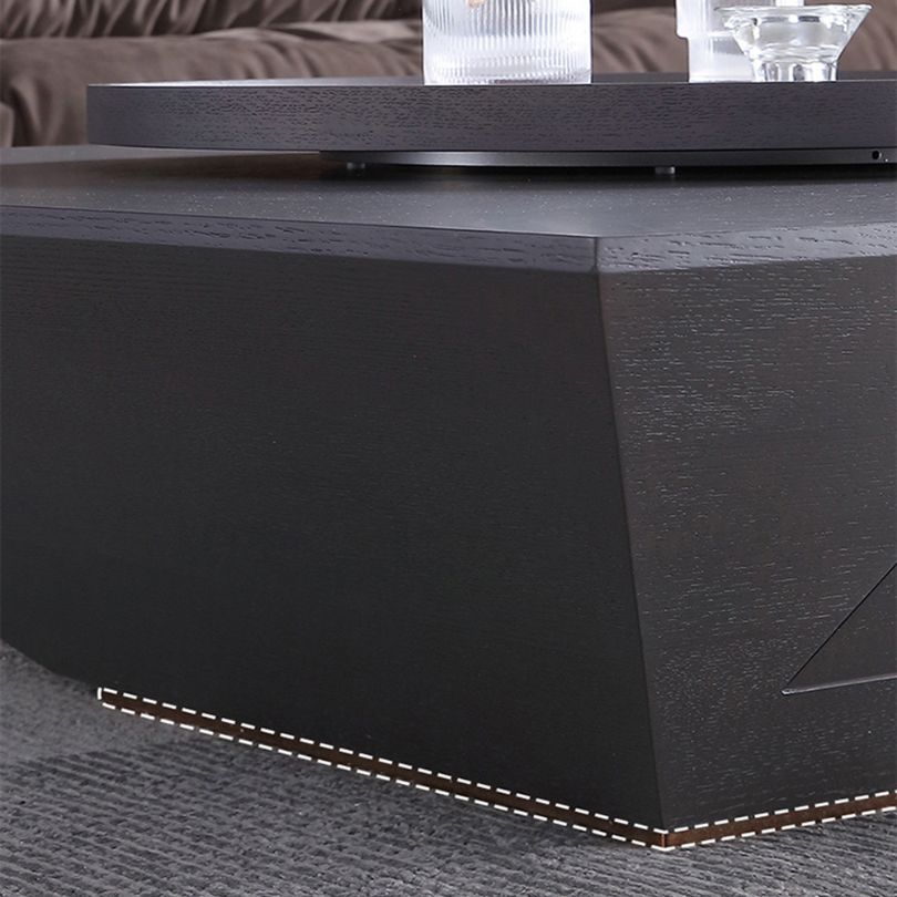 Spacious drawer details of the black coffee table with Lazy Susan in a stylish home office.
