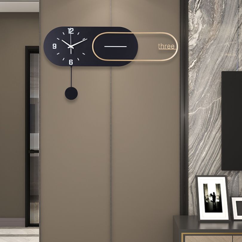 Close-up of the bear statue design on the black wall clock, highlighting its unique artistic flair.