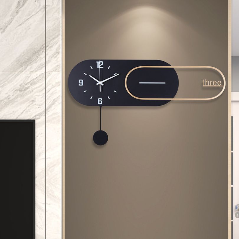 Sleek black wall clock displayed in a modern living room setting, accentuating minimalist decor.