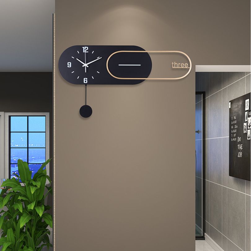 The black minimalist wall clock on an office wall, demonstrating its stylish functionality.