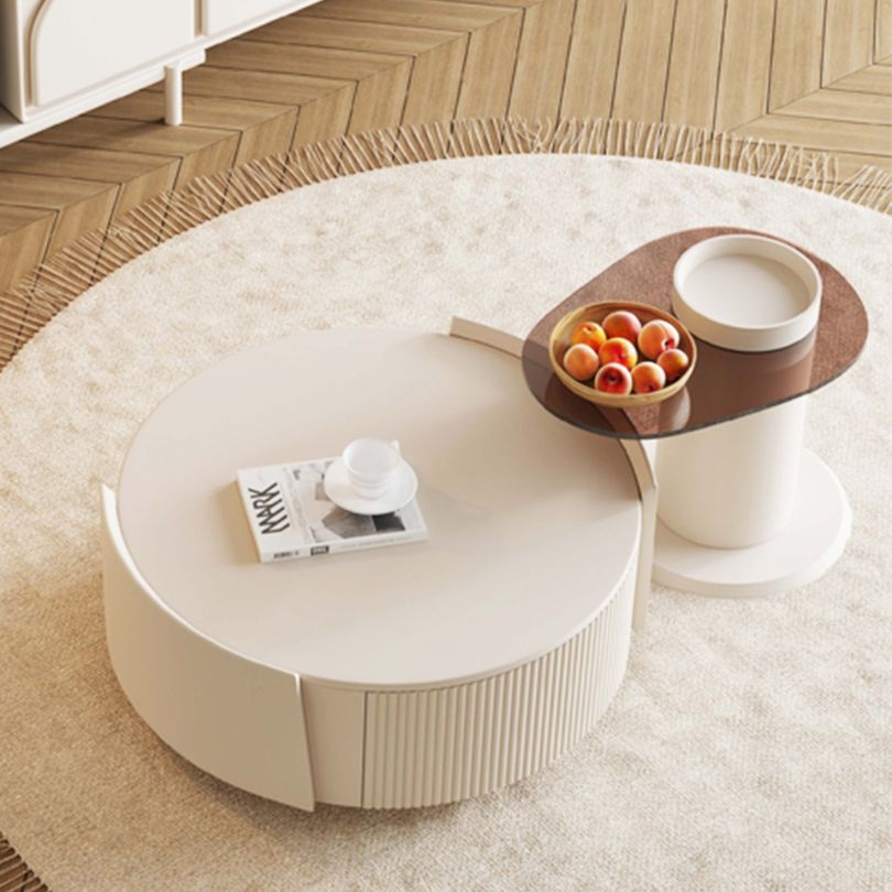 Versatile small table from the coffee table set, used as a side table with decorative items.