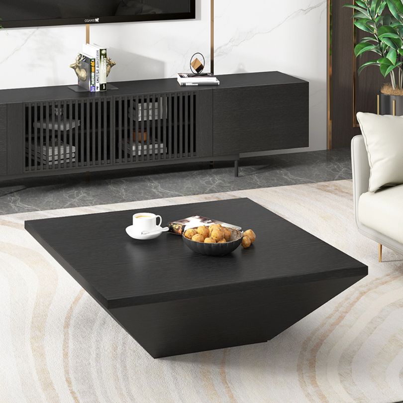 Close-up of the walnut coffee tables surface, emphasizing the high-quality veneer and modern aesthetics.