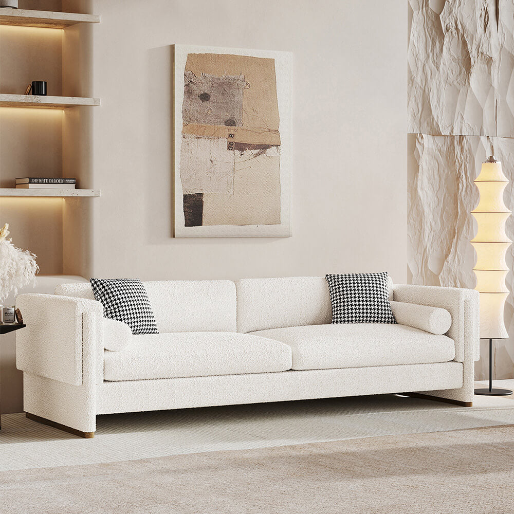 Front view of the Elegance 3-Seater White Sofa with Armrests in a stylish living room setting.