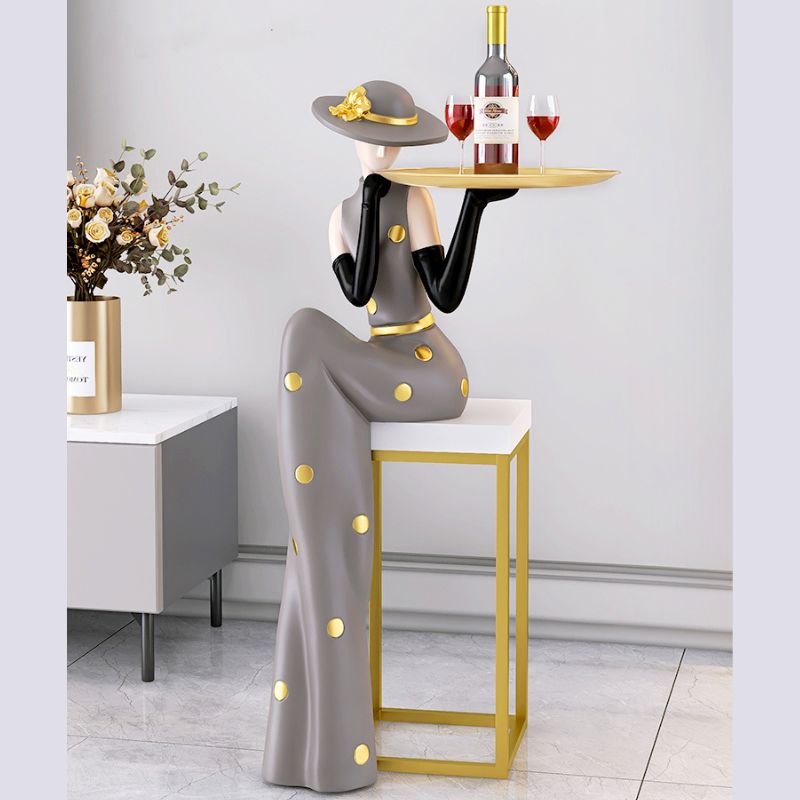 Chic modern abstract floor ornament showcasing vibrant colors and a storage tray.