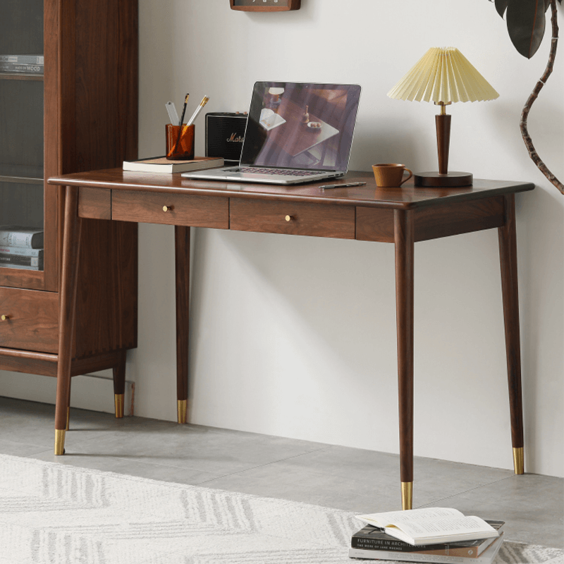 Elegant black walnut writing desk shown in a home office setting, showcasing its stylish design and functionality.