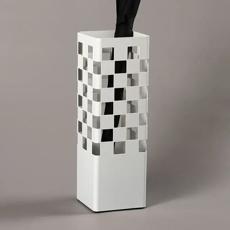 Side view of GridForm umbrella stand showing checkerboard design and drip tray