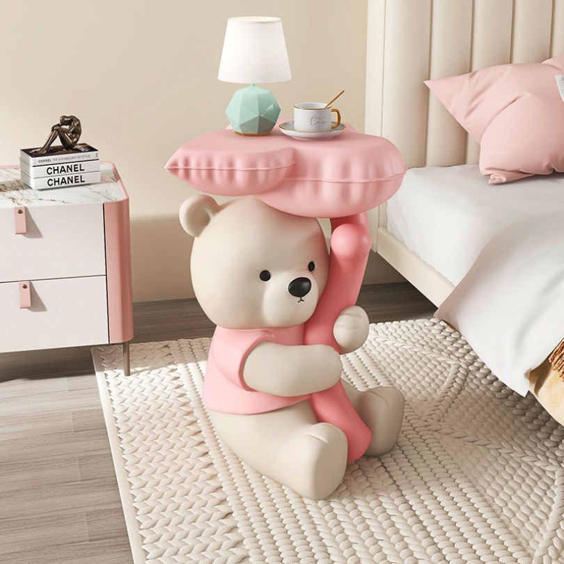 Stylish bear figurine displayed in a cozy living room setting, showcasing its storage capability.