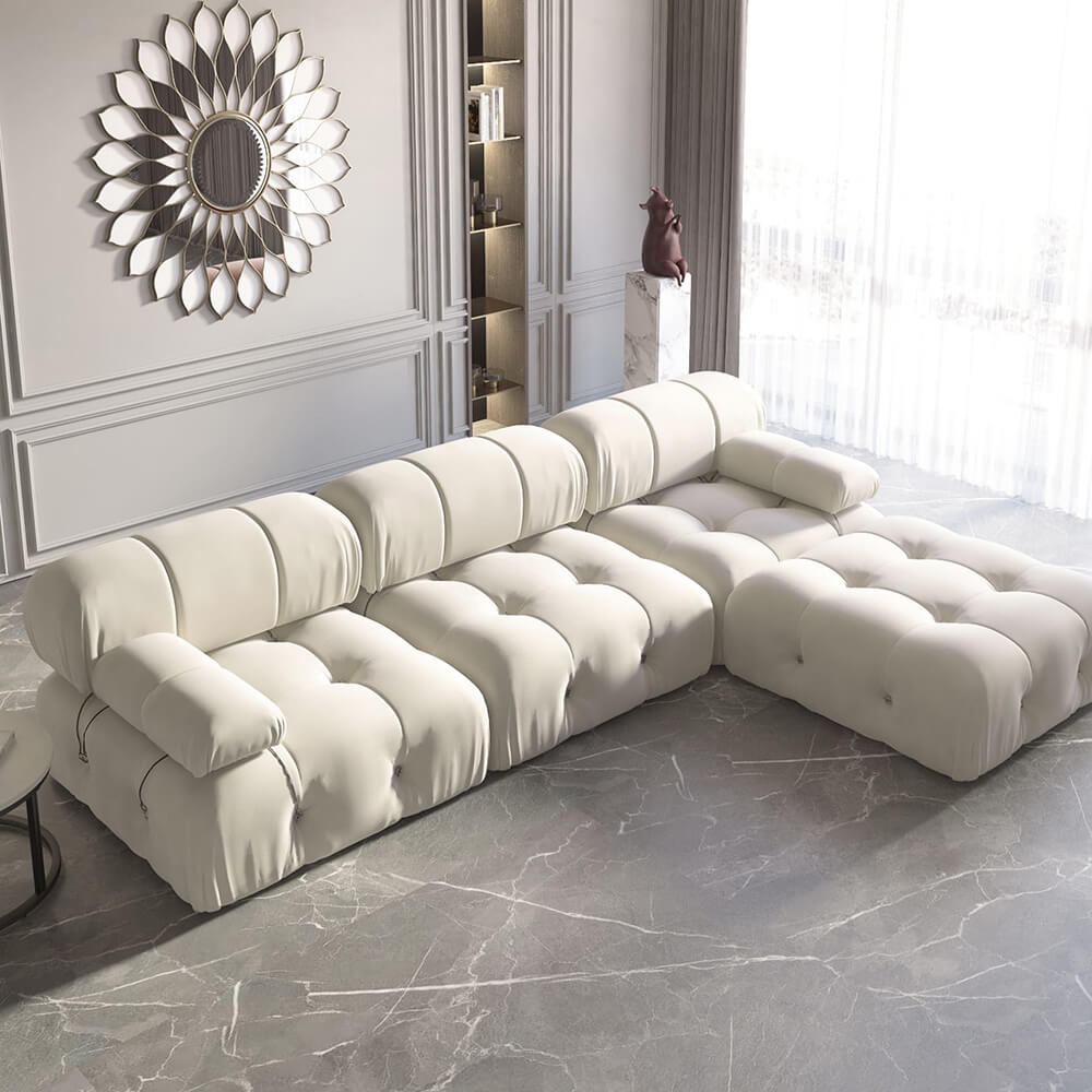 View of the chic beige modern L-shaped sectional sofa in a cozy living room setup.