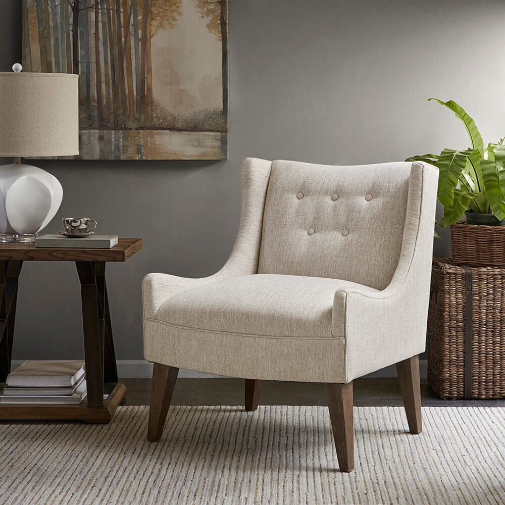 Chic Malcolm Accent Chair with wooden legs, perfect for modern living rooms.