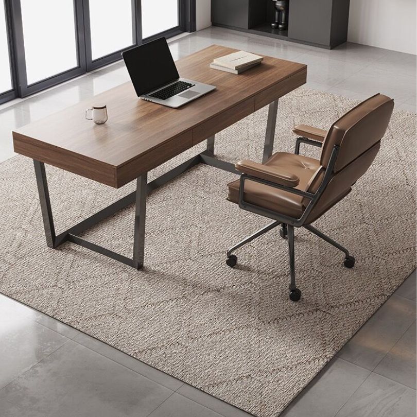 Elegant solid wood computer desk showcasing a nut brown finish and iron frame from a side angle.