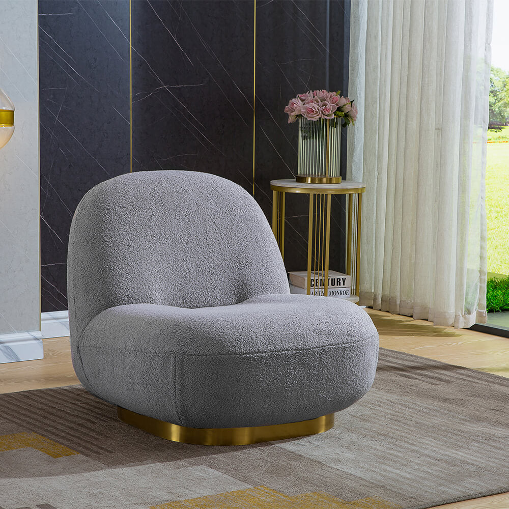 Chic modern swivel accent chair in grey with gold base, showcasing its elegant design from the side.