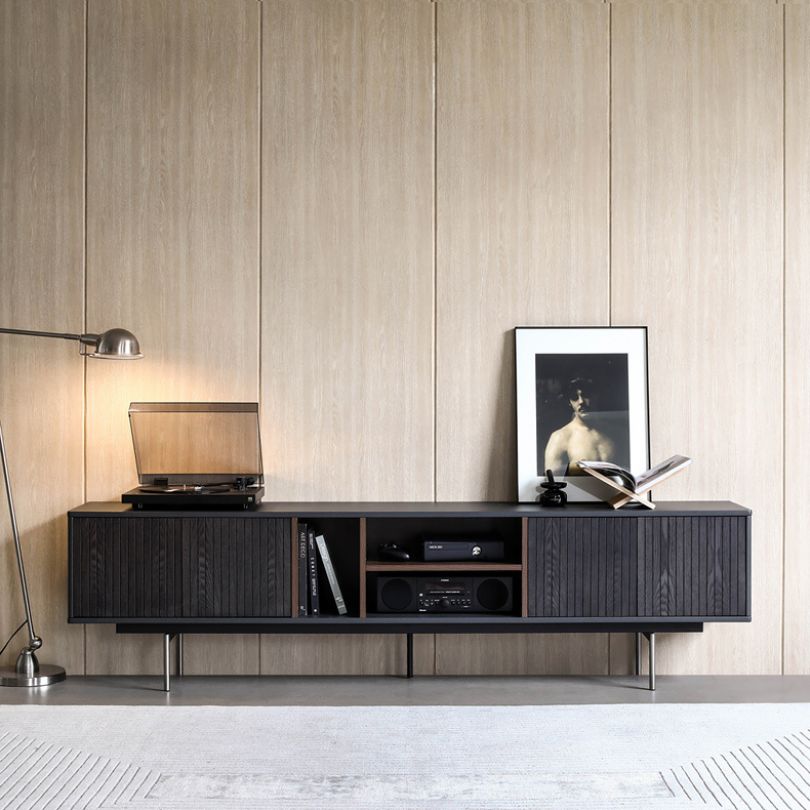 Front view of modern wood TV stand with open cabinet and side doors
