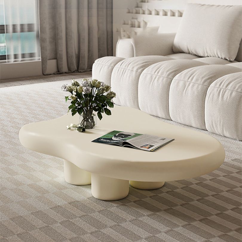Beige Nordic Cloud coffee table showcasing its elegant design from the side.