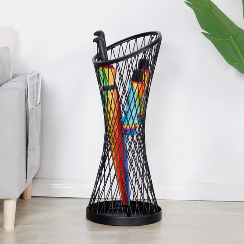 Modern metal umbrella stand with a sleek design and drip tray in black