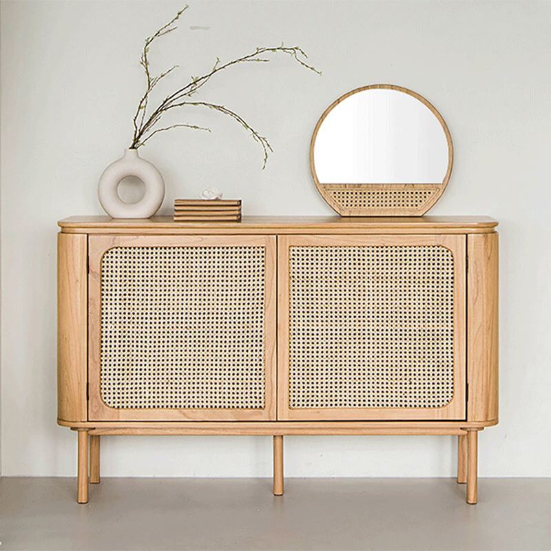 Nordic rattan sideboard with adjustable shelves from a side angle, showcasing its elegant design.