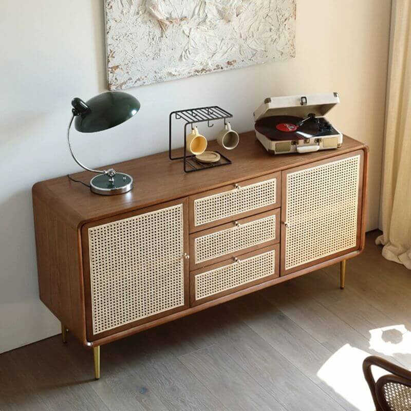 Stylish Nordic rattan sideboard buffet in a bright dining area.