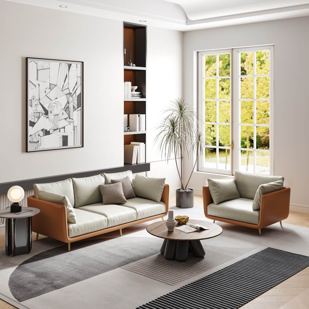 Front view of Scandinavian orange arm sofa with gold legs in a chic living room setting.