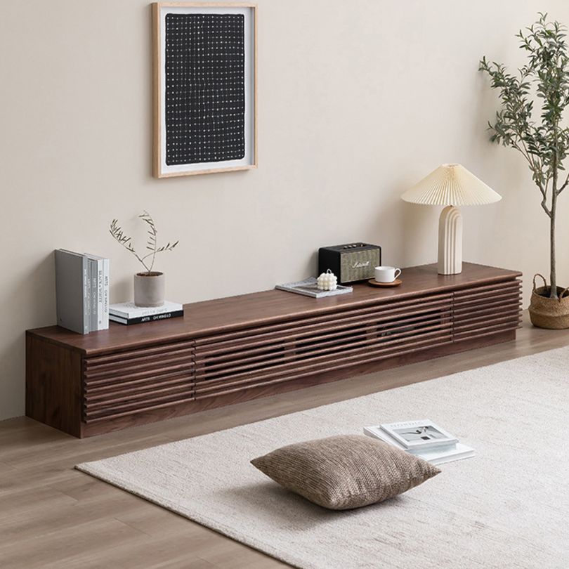 Mid-century slatted media console from the front view, highlighting its elegant design and storage options.