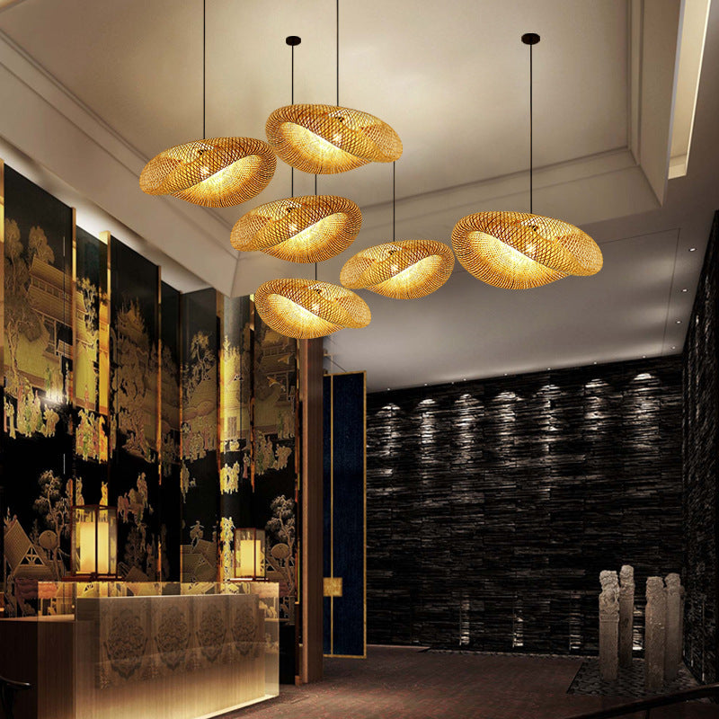 Close-up of the handcrafted bamboo pendant light showcasing its woven texture.