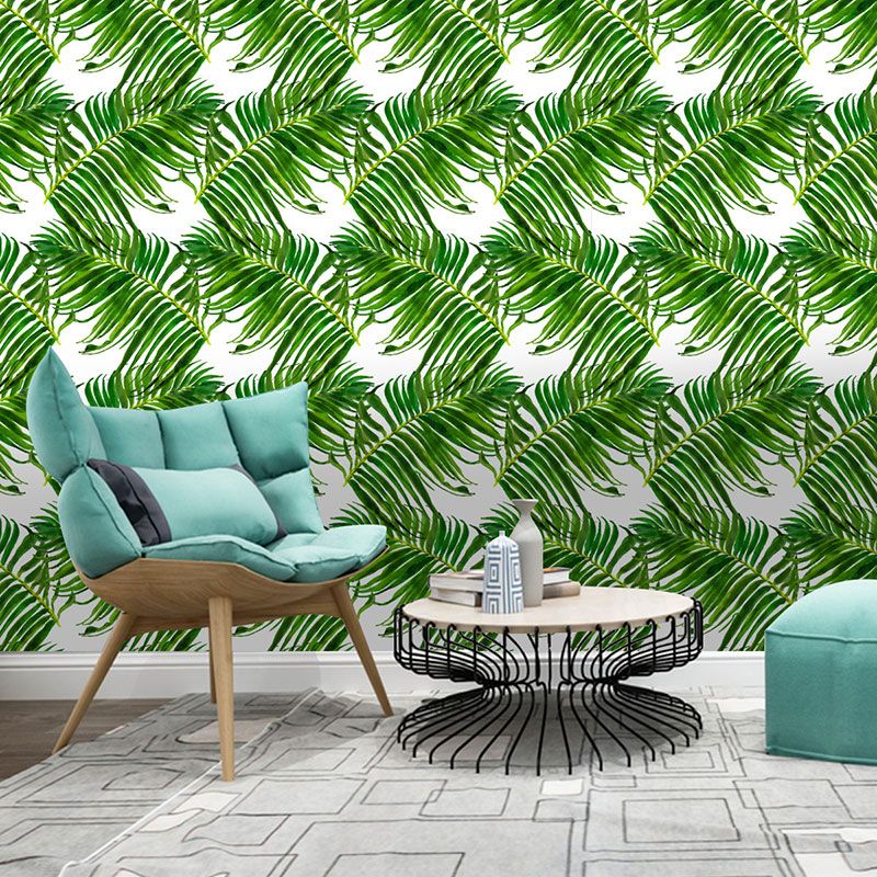 Peel and stick palm tree wallpaper in a bright living room setting.