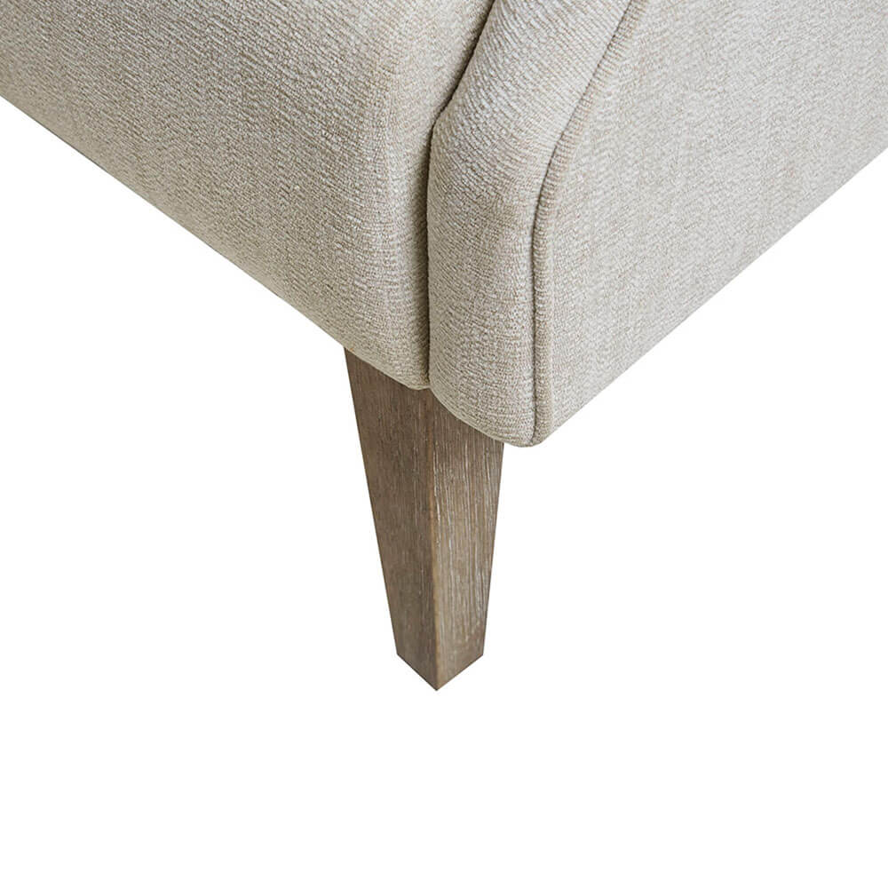 Malcolm Vintage Accent Chair positioned in a bright living room, highlighting its modern aesthetic.