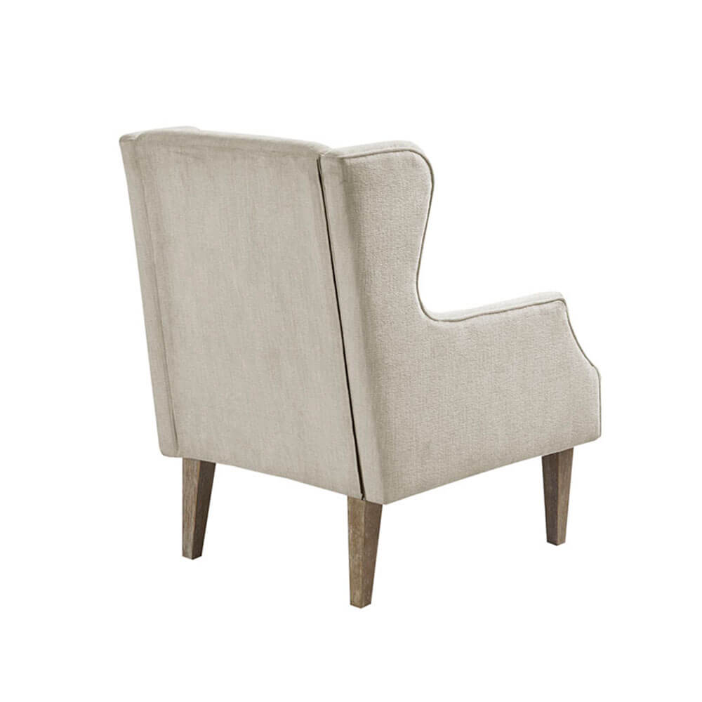 Side view of the Malcolm Vintage Accent Chair showcasing its elegant design and comfortable fabric.