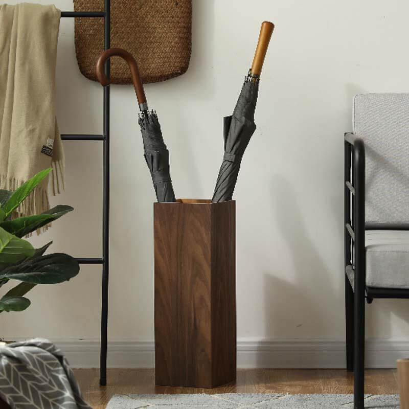 Nordik style wooden umbrella holder showcasing its elegant design in an entryway.