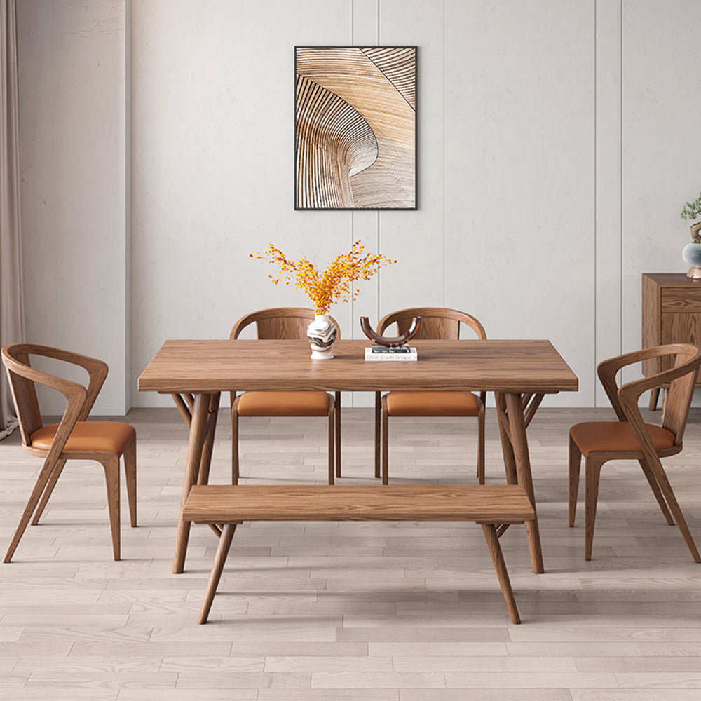 Close-up of the sturdy wooden frame and supports of the dining table.