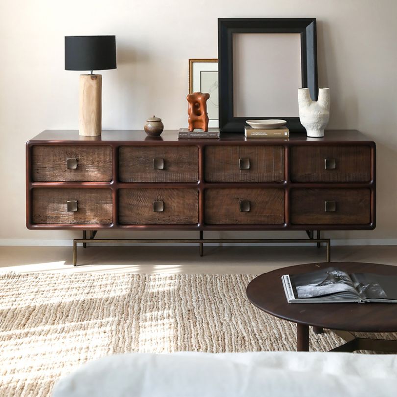 Front angle of the stylish 8-drawer buffet table showcasing brass handles and dark wood finish