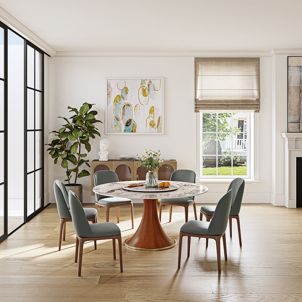 Elegant round dining table with sintered stone top and turntable, showcasing its design and functionality.