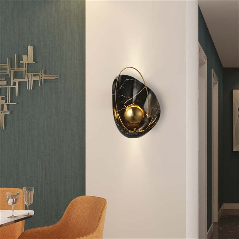 Contemporary Pearl LED Wall Sconce showcasing intricate shell design, perfect for living room decor.